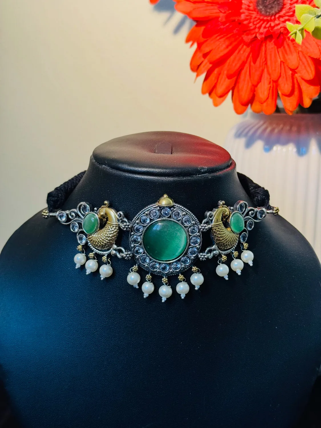 Green-stone peacock choker with pearl drops from Alankara