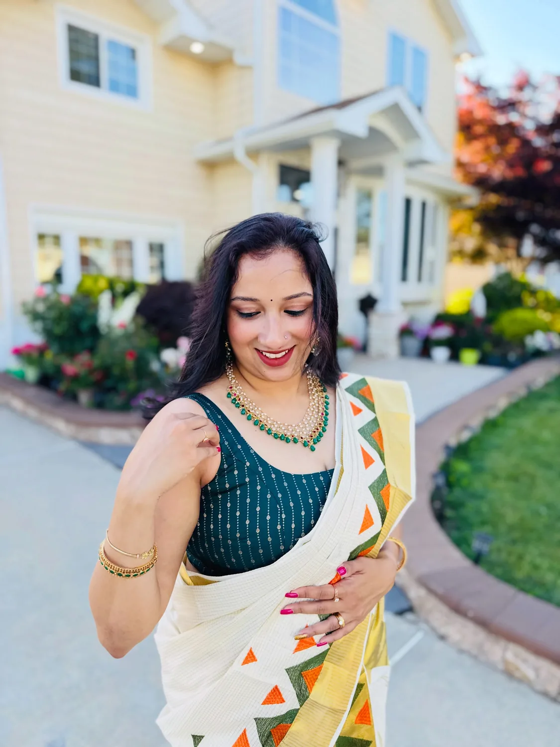 Alankara layered pearl, red and green occasion jewellery