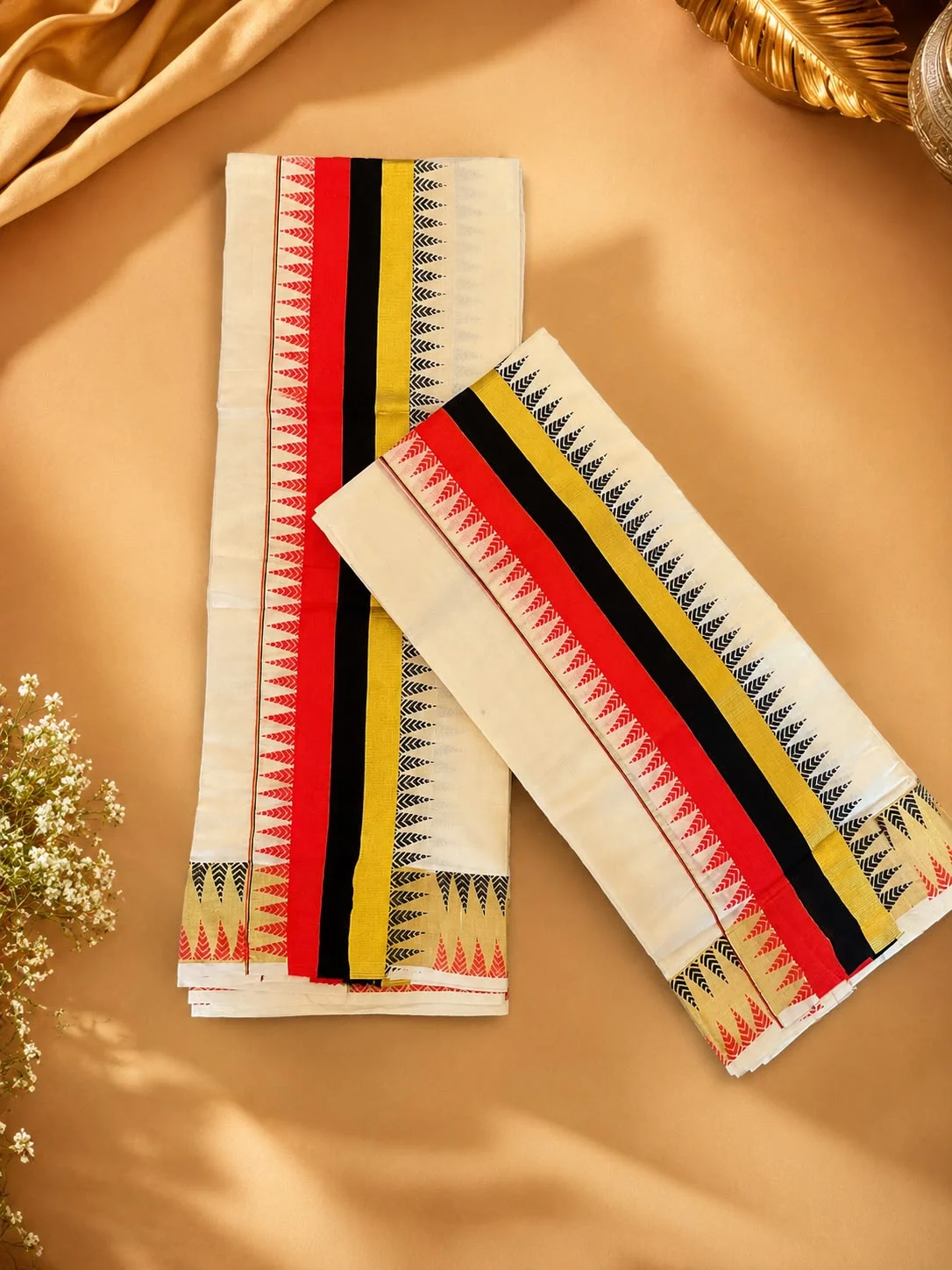 Ivory Kerala set mundu with red, black and gold woven borders
